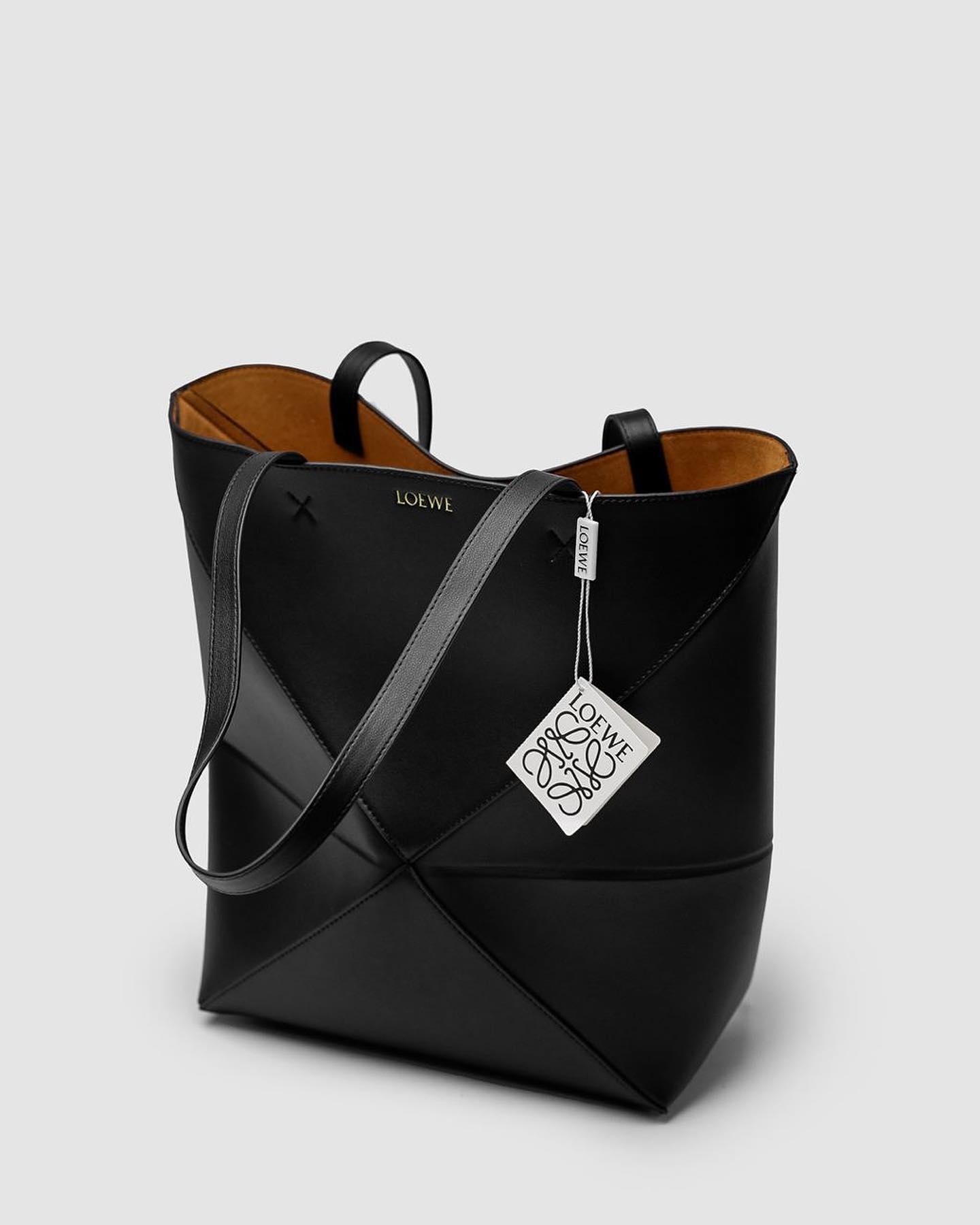 Medium Puzzle Fold tote in shiny calfskin